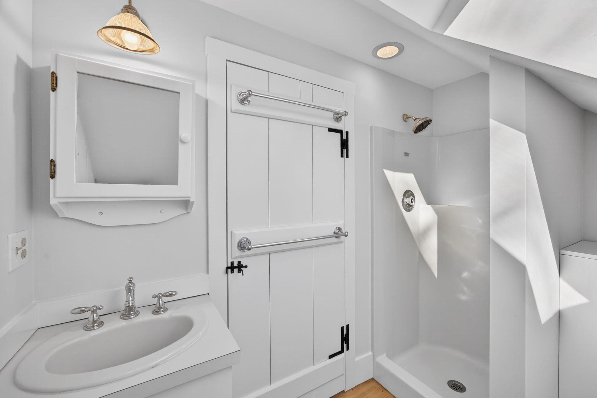 14 Bambi Way Orleans, MA 02653 - Photo 48 of 59 a bathroom with a sink a mirror and a shower