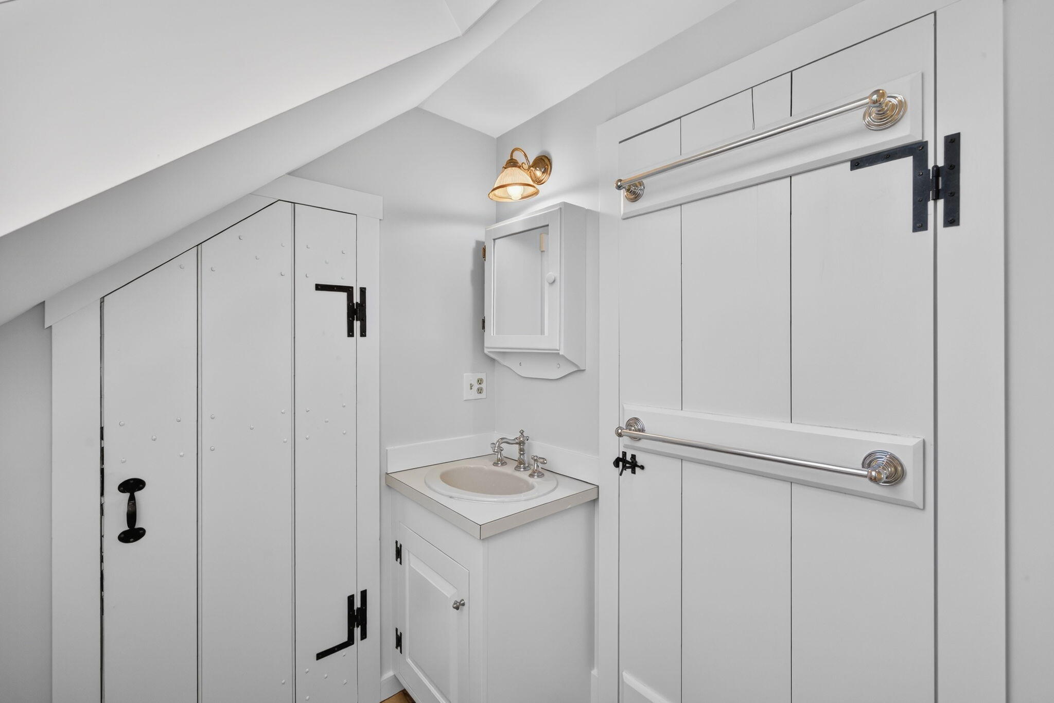 14 Bambi Way Orleans, MA 02653 - Photo 49 of 59 a bathroom with a sink a mirror and shower