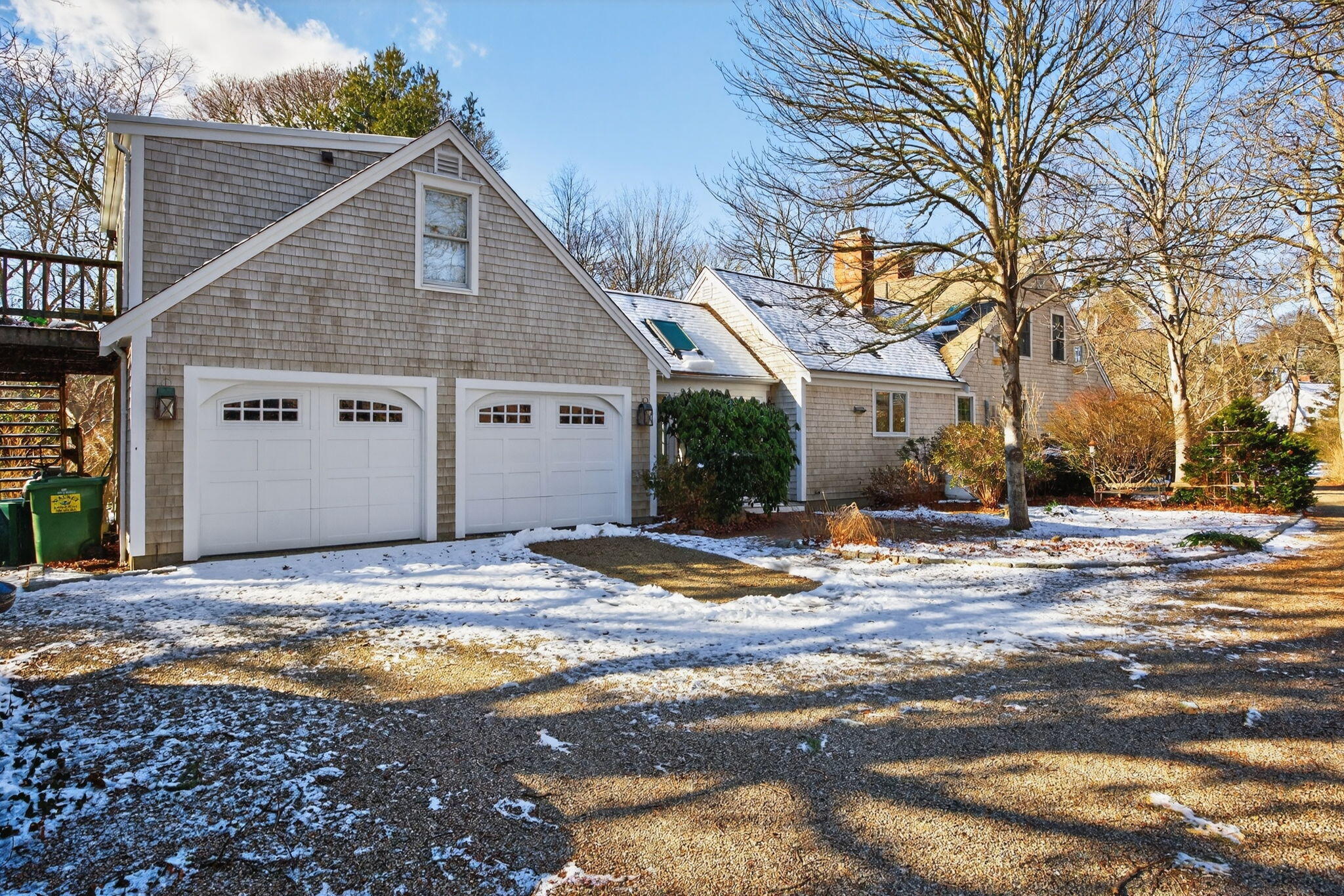 14 Bambi Way Orleans, MA 02653 - Photo 59 of 59 a view of a house with snow on the side of road