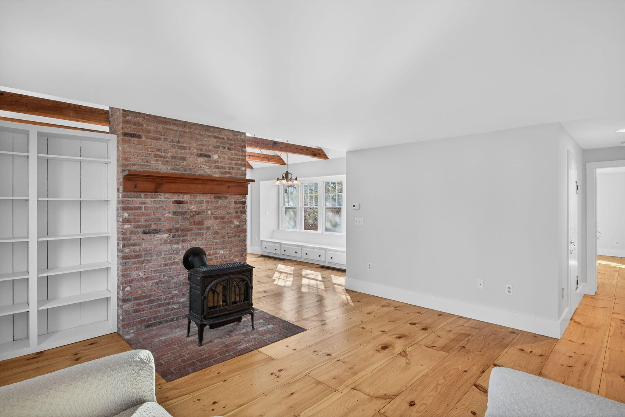 14 Bambi Way Orleans, MA 02653 - Photo 8 of 59 a living room with furniture and a fireplace