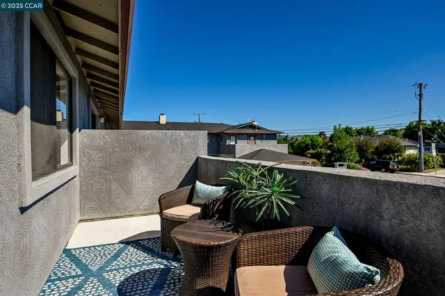 a view of balcony with furniture and outdoor space