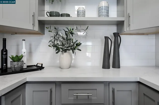 a close view of sink and cabinets