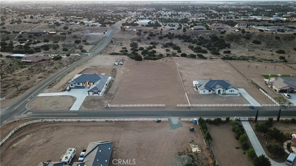 0 Barker Road Oak Hills, CA 92344 - Photo 2 of 13 an aerial view of a house with a yard