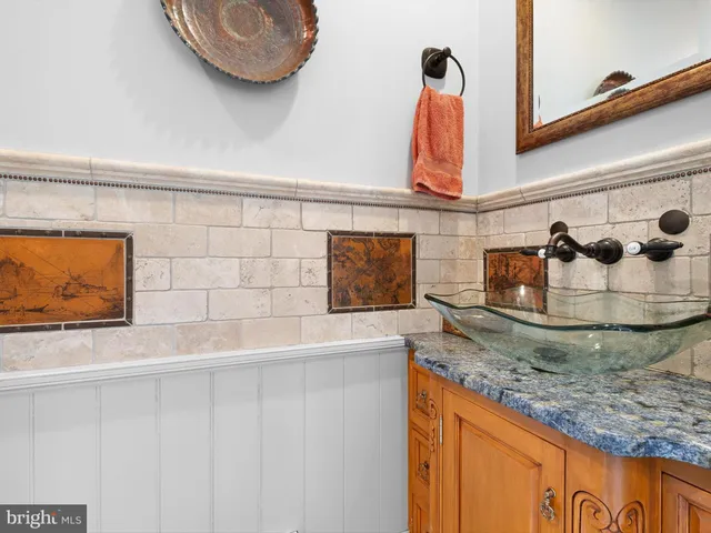 a view of a patio with a table and chairs