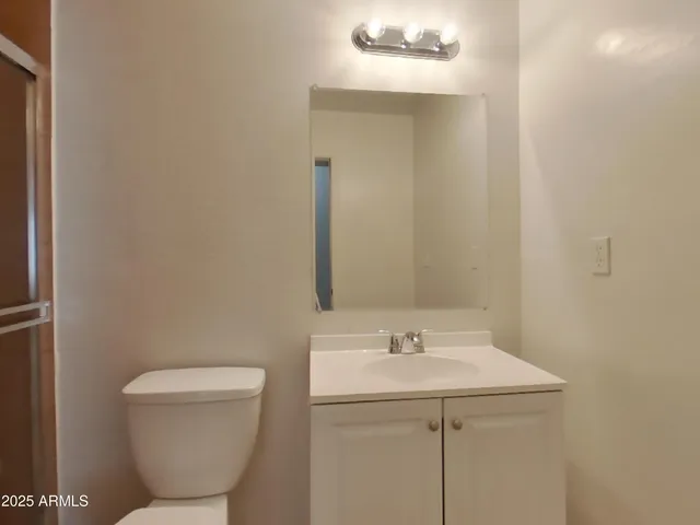 a bathroom with a sink and a toilet
