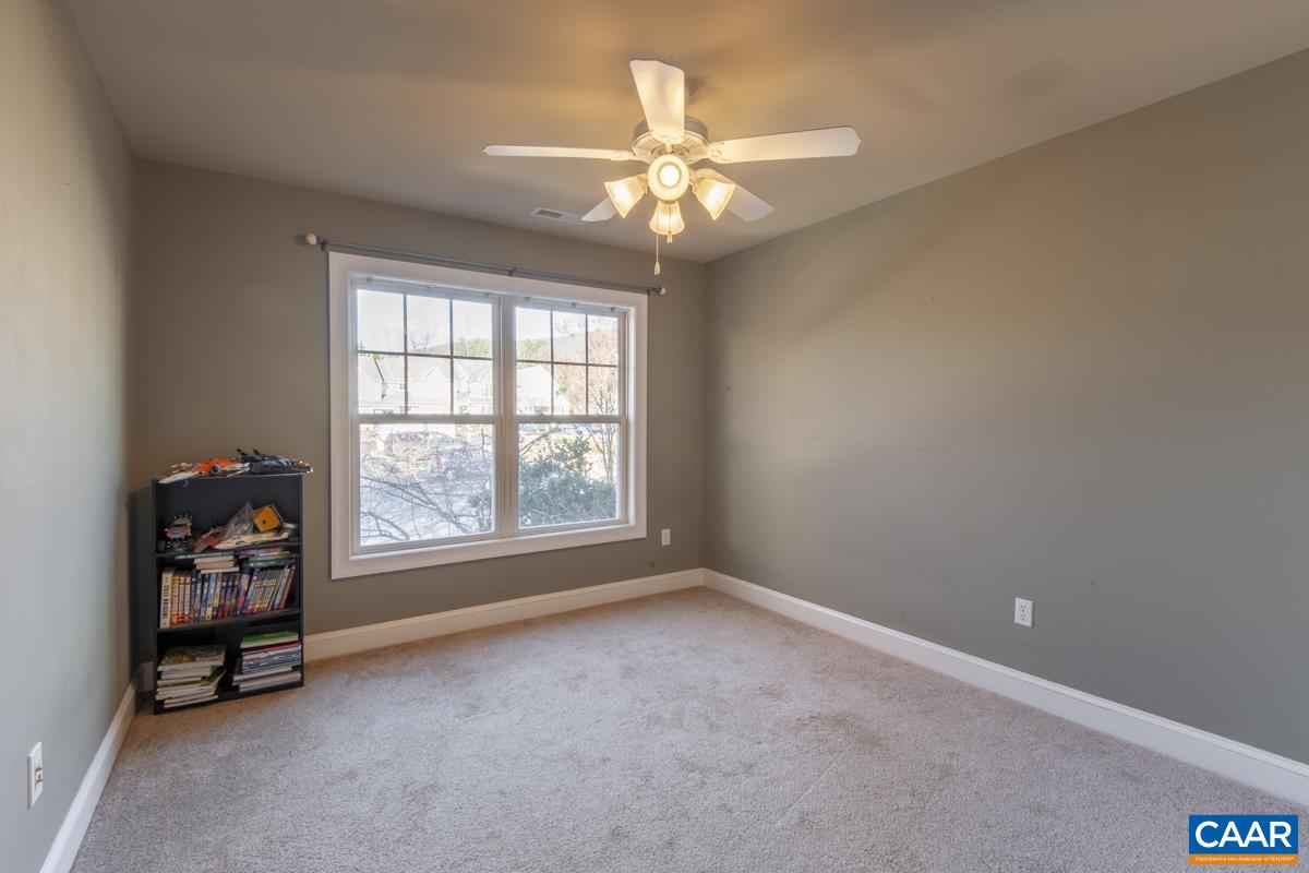 1140 Edmond Court Crozet, VA 22932 - Photo 25 of 34 an empty room with windows and fan