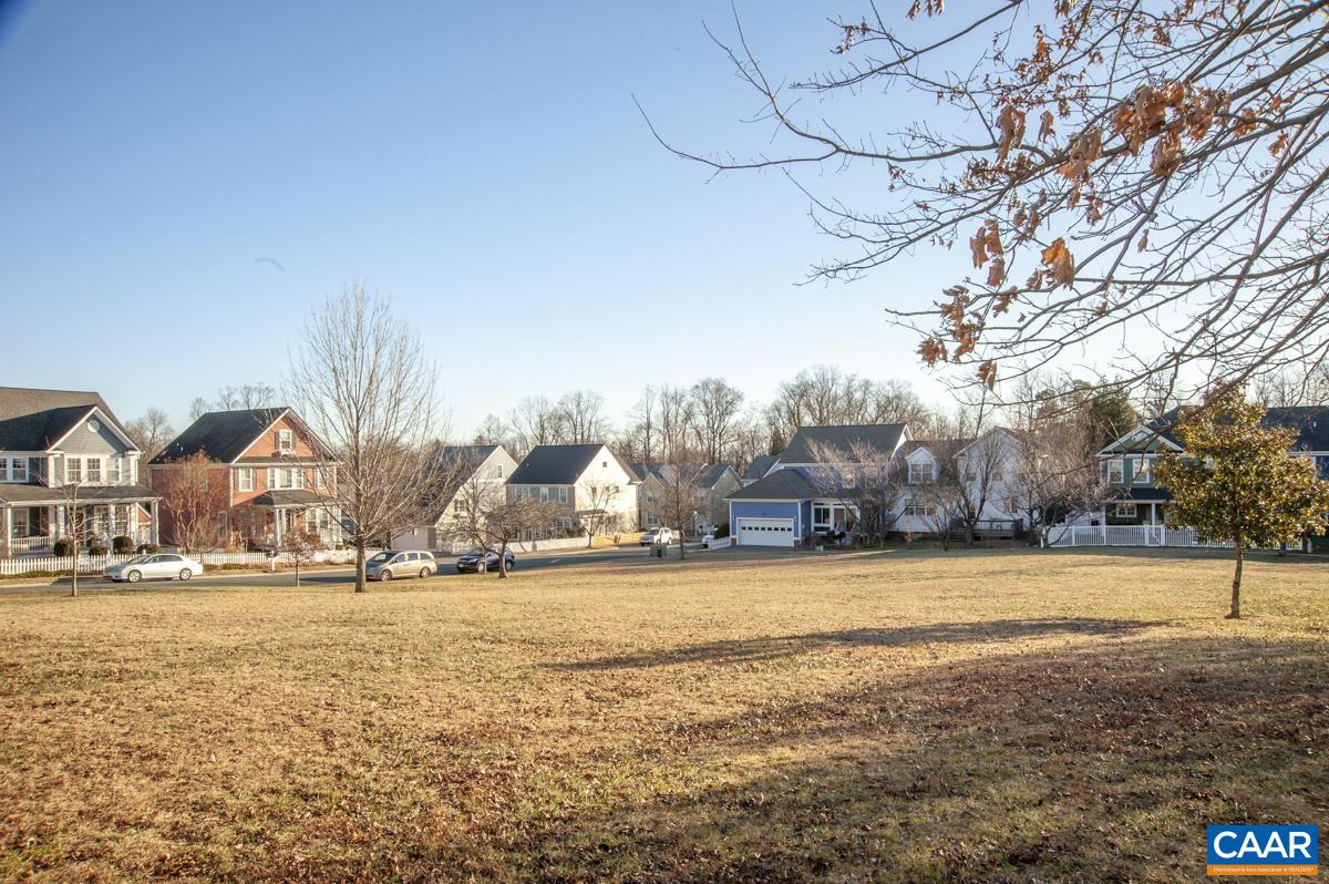 1140 Edmond Court Crozet, VA 22932 - Photo 29 of 34 a view of a yard with a house in the background
