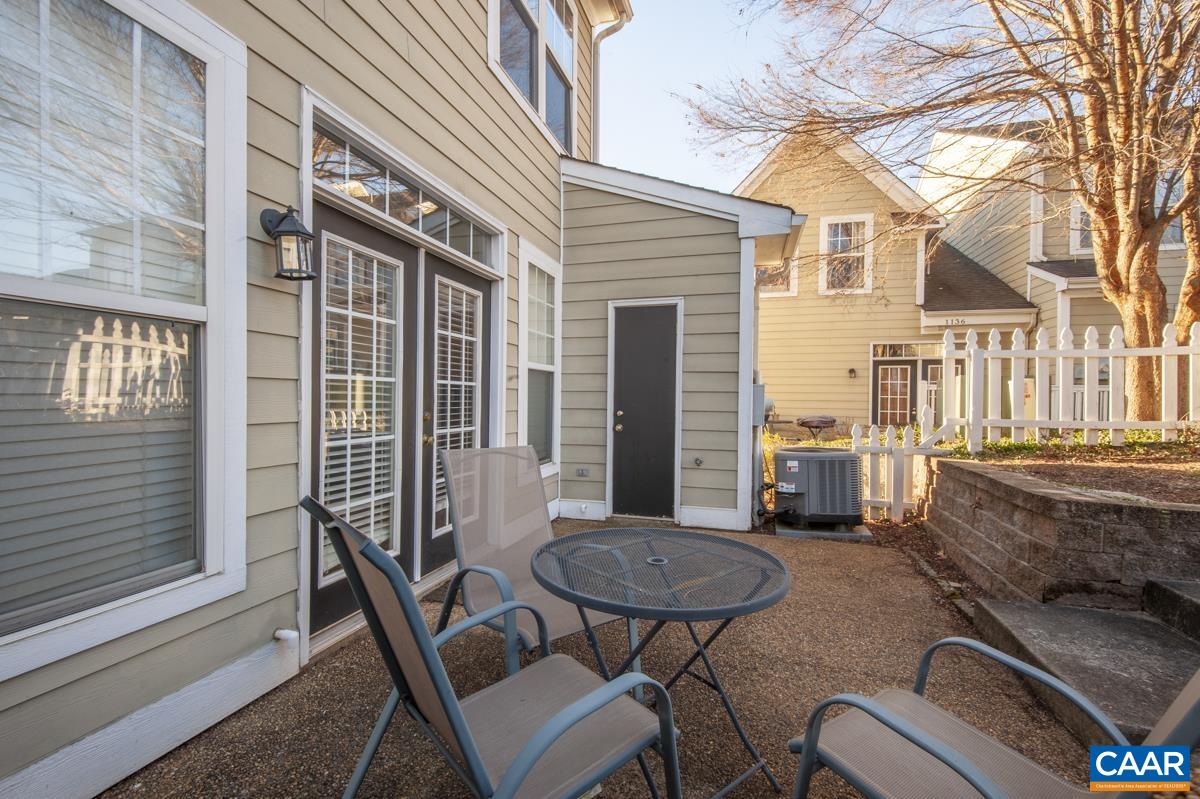 1140 Edmond Court Crozet, VA 22932 - Photo 30 of 34 a view of a house with backyard and sitting area