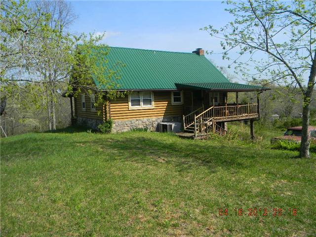 1180 Haskell Akins Road Bethpage, TN 37022 - Photo 3 of 5 a front view of a house with garden