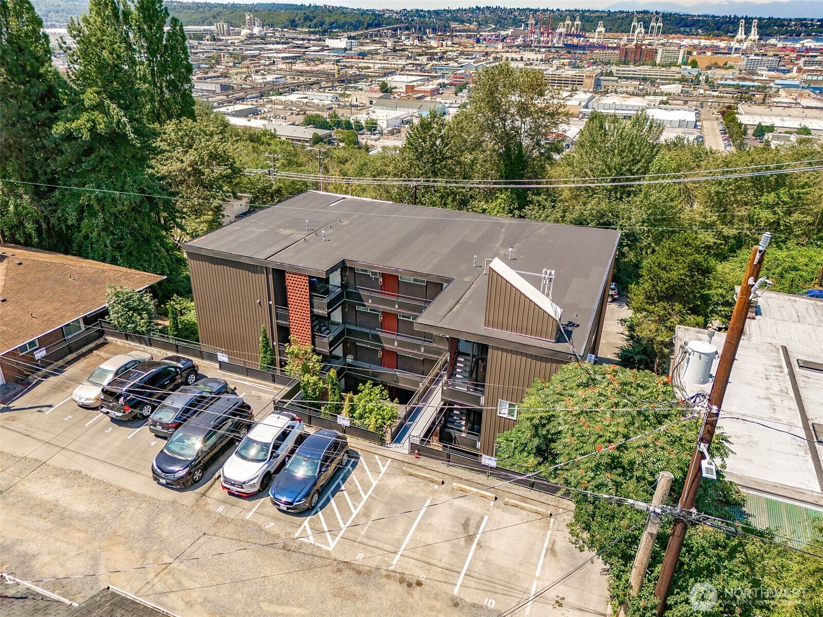 2414 13th Avenue South Seattle, WA 98144 - Photo 12 of 17 an aerial view of a house with yard swimming pool and outdoor seating