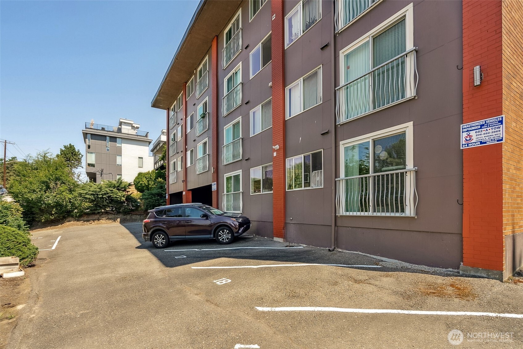 2414 13th Avenue South Seattle, WA 98144 - Photo 15 of 17 a car parked in front of a building