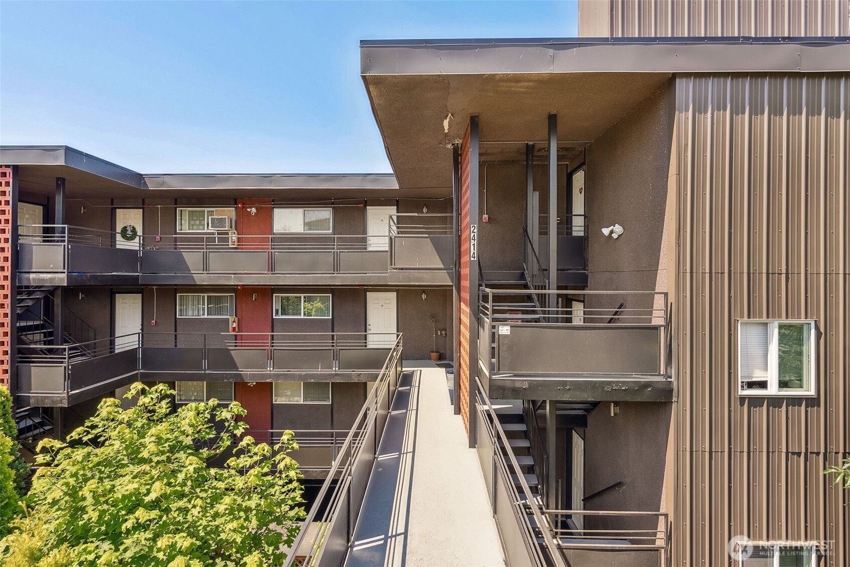 2414 13th Avenue South Seattle, WA 98144 - Photo 3 of 17 a front view of a house with a garden