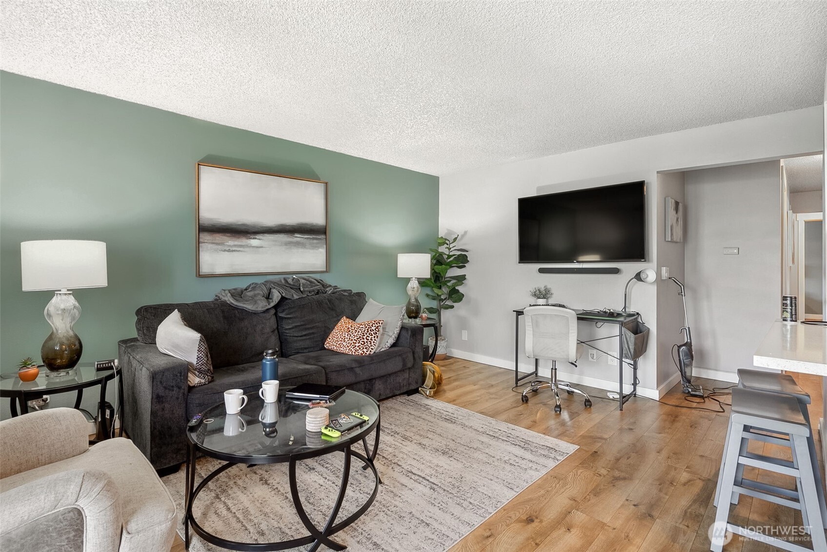 2414 13th Avenue South Seattle, WA 98144 - Photo 7 of 17 a living room with furniture and a flat screen tv