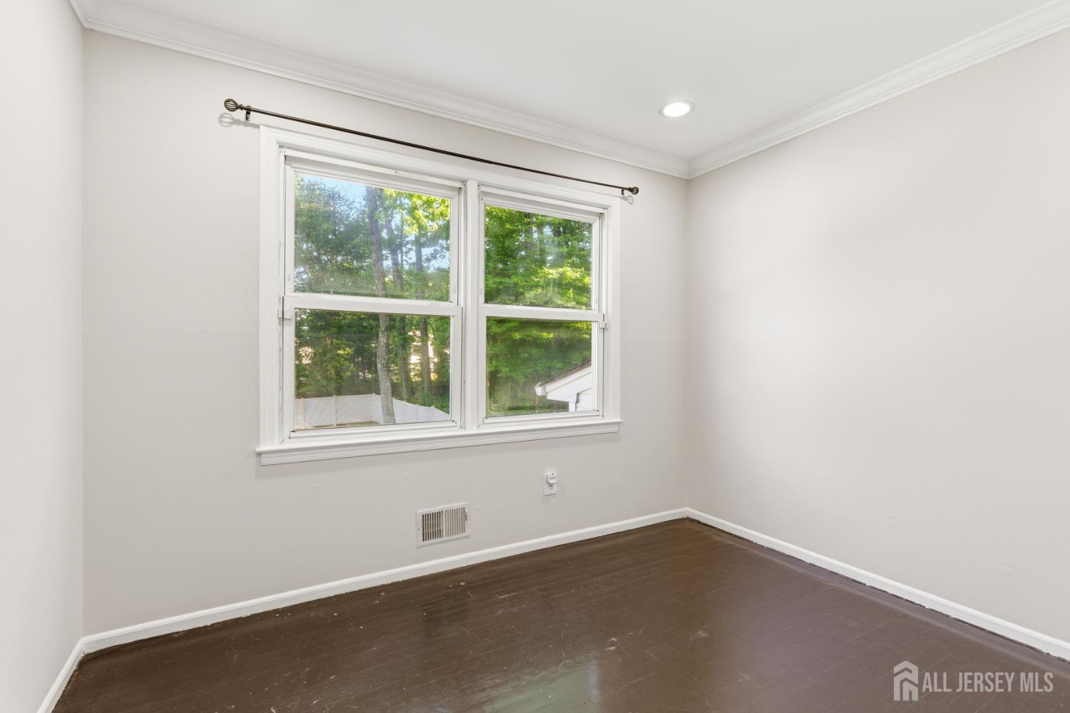 5 McKinley Street Edison, NJ 08820 - Photo 24 of 38 an empty room with a window