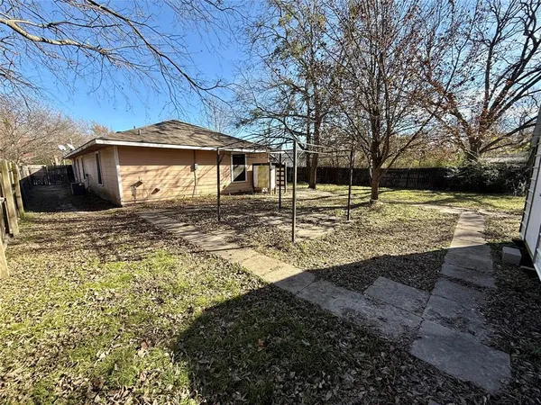 a view of a yard with an outdoor space
