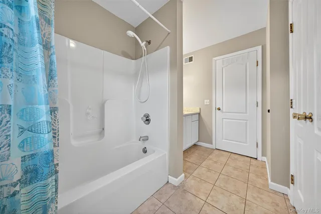 a view of a golf course with a lake