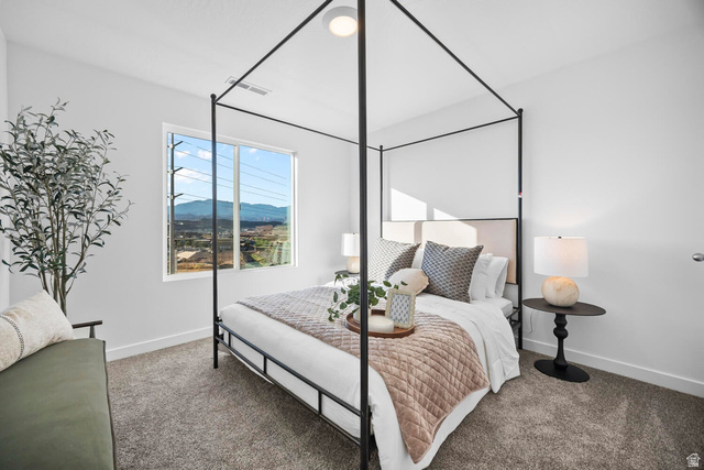 2123 Wolverine Way, Unit 2437 Washington, UT 84780 - Photo 29 of 40 Bright room featuring a large picture window, light gray carpeting, and white walls