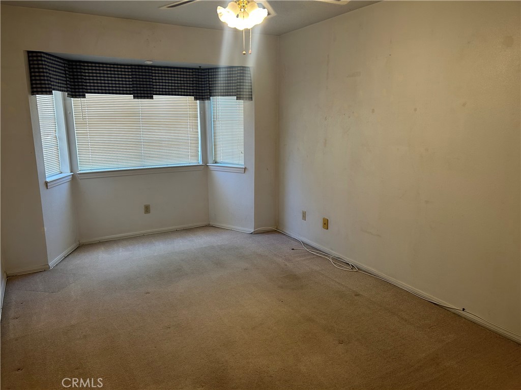 20187 Itasca Road Apple Valley, CA 92308 - Photo 12 of 35 a view of an empty room with a window