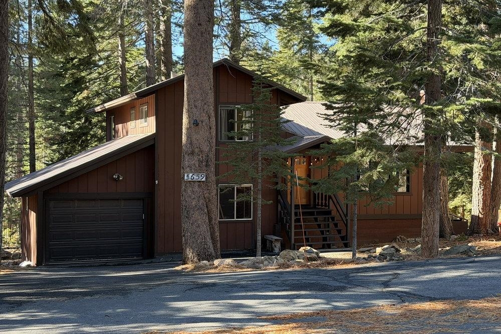 5659 Rhodesia Road Carnelian Bay, CA 96140 - Photo 23 of 28 a view of street along with house and trees