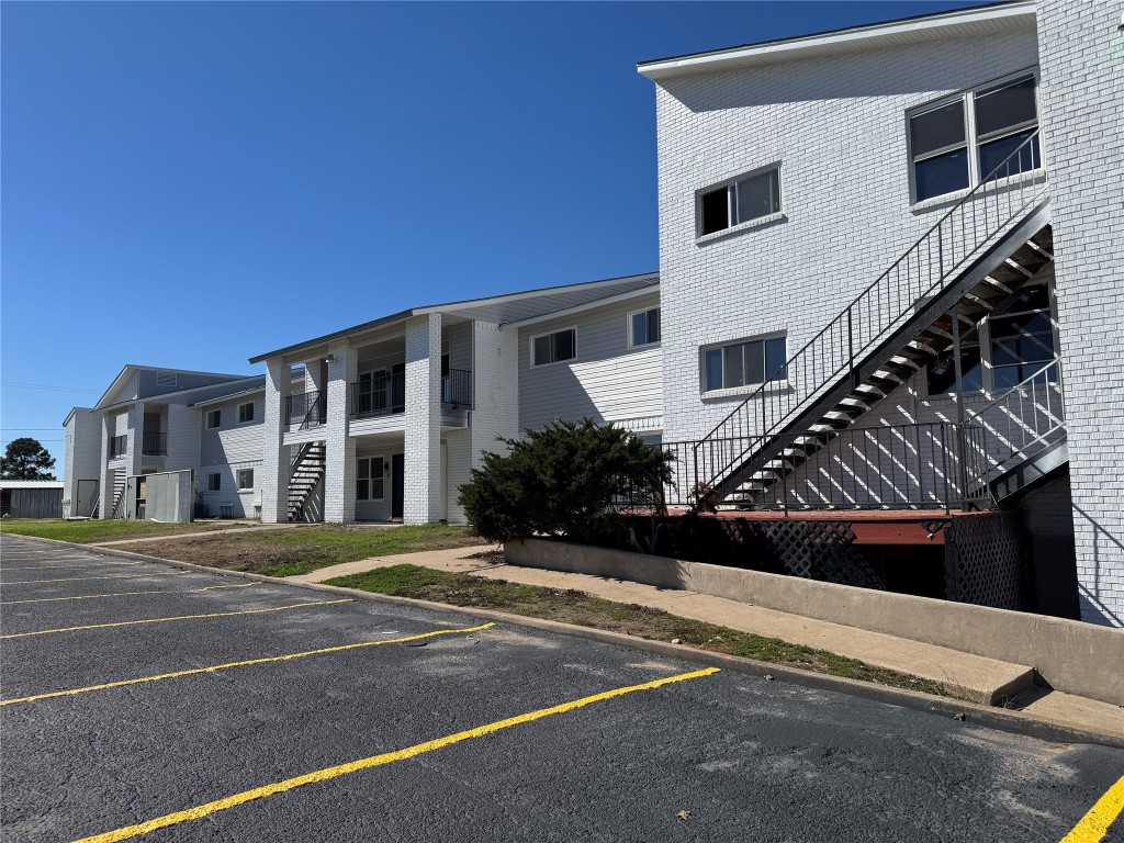 345 Fm 86, Unit 14 Luling, TX 78648 - Photo 1 of 1 a view of a building with a street