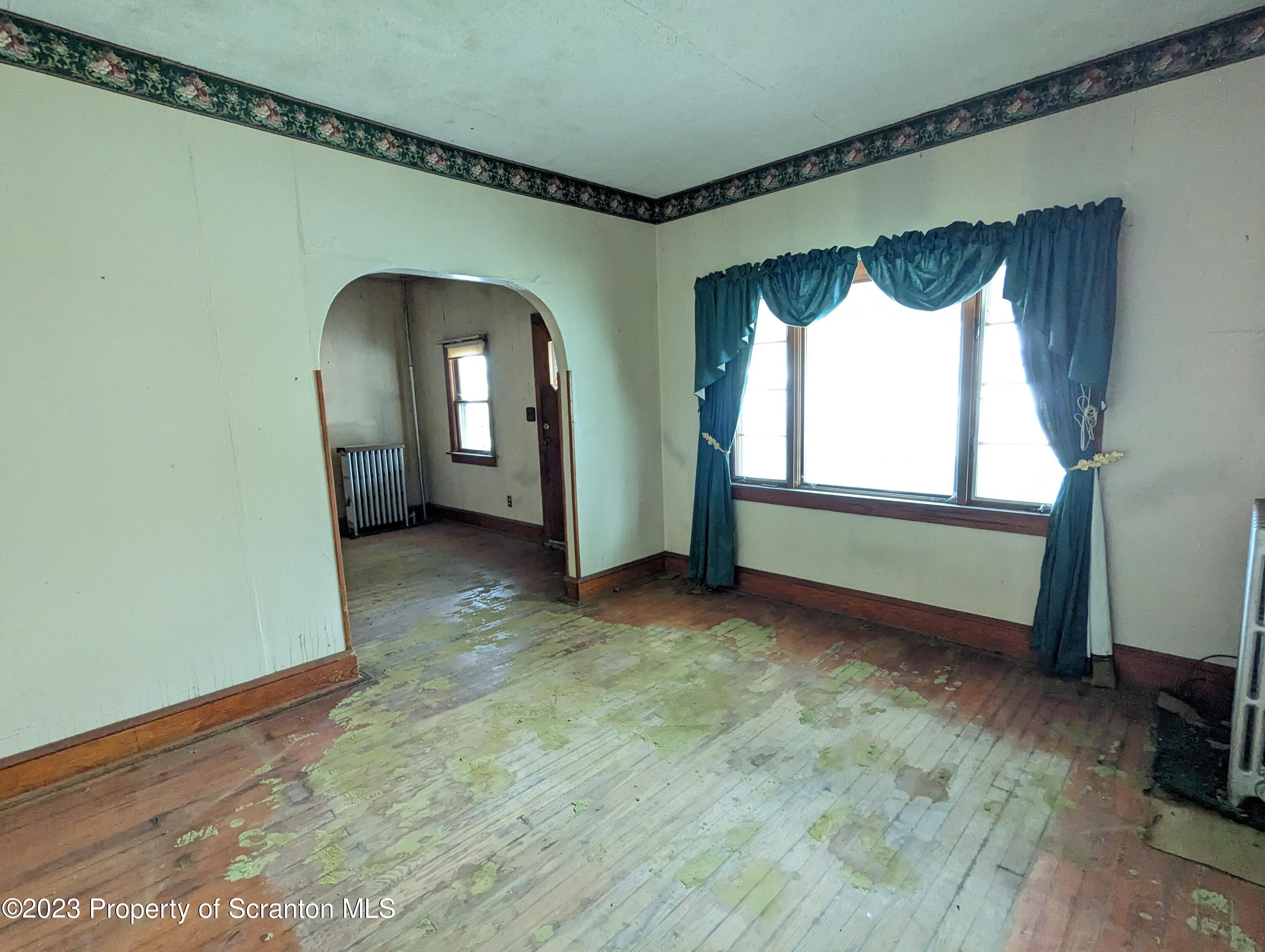 710 Edgebrook Drive Moosic, PA 18507 - Photo 11 of 19 a view of an empty room with a window
