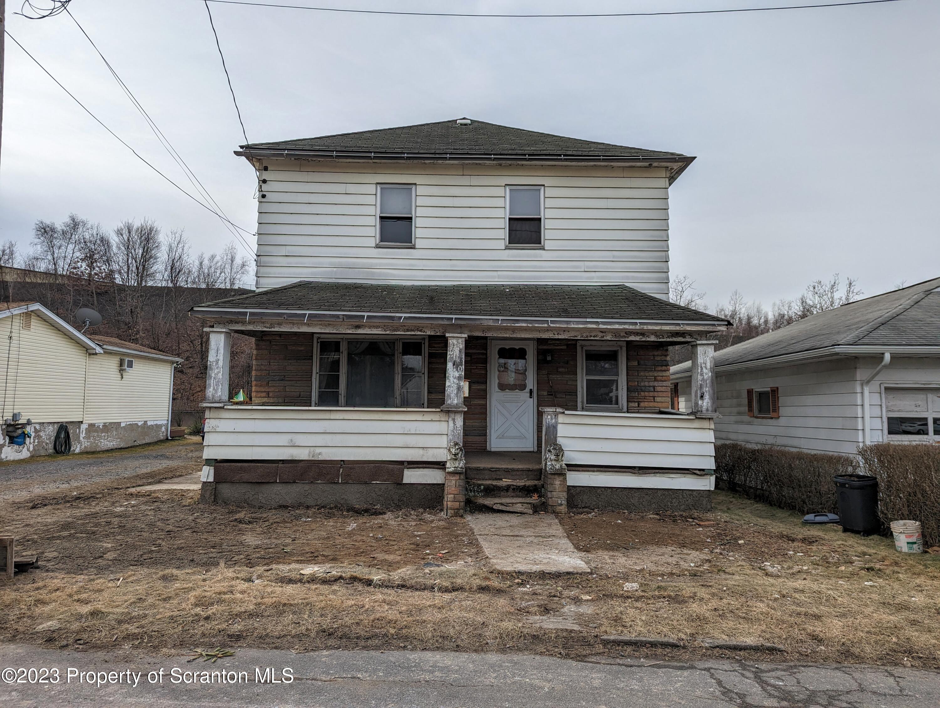 710 Edgebrook Drive Moosic, PA 18507 - Photo 19 of 19 a view of a house with a yard and wooden fence