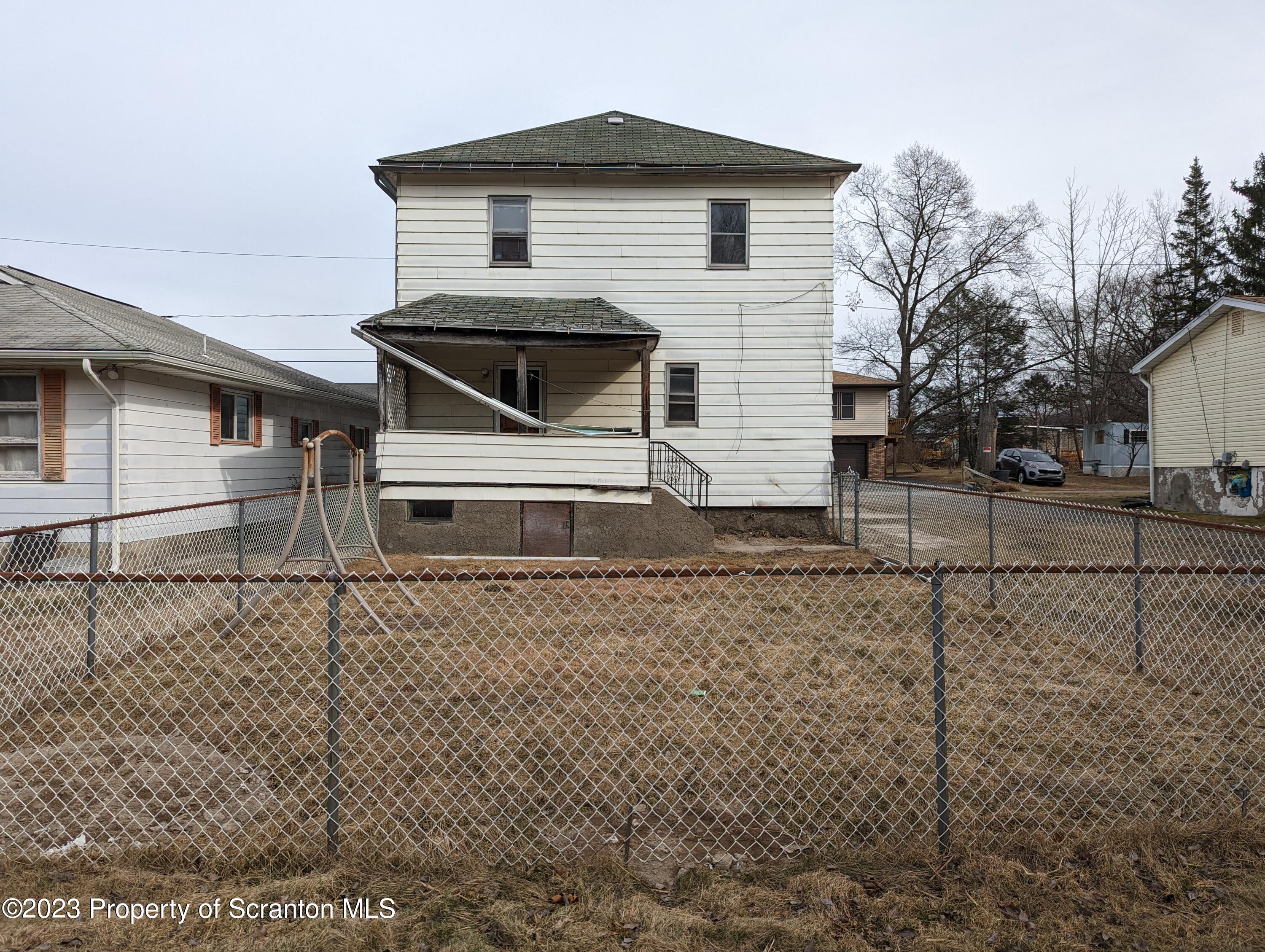 710 Edgebrook Drive Moosic, PA 18507 - Photo 3 of 19 a front view of a house with garage