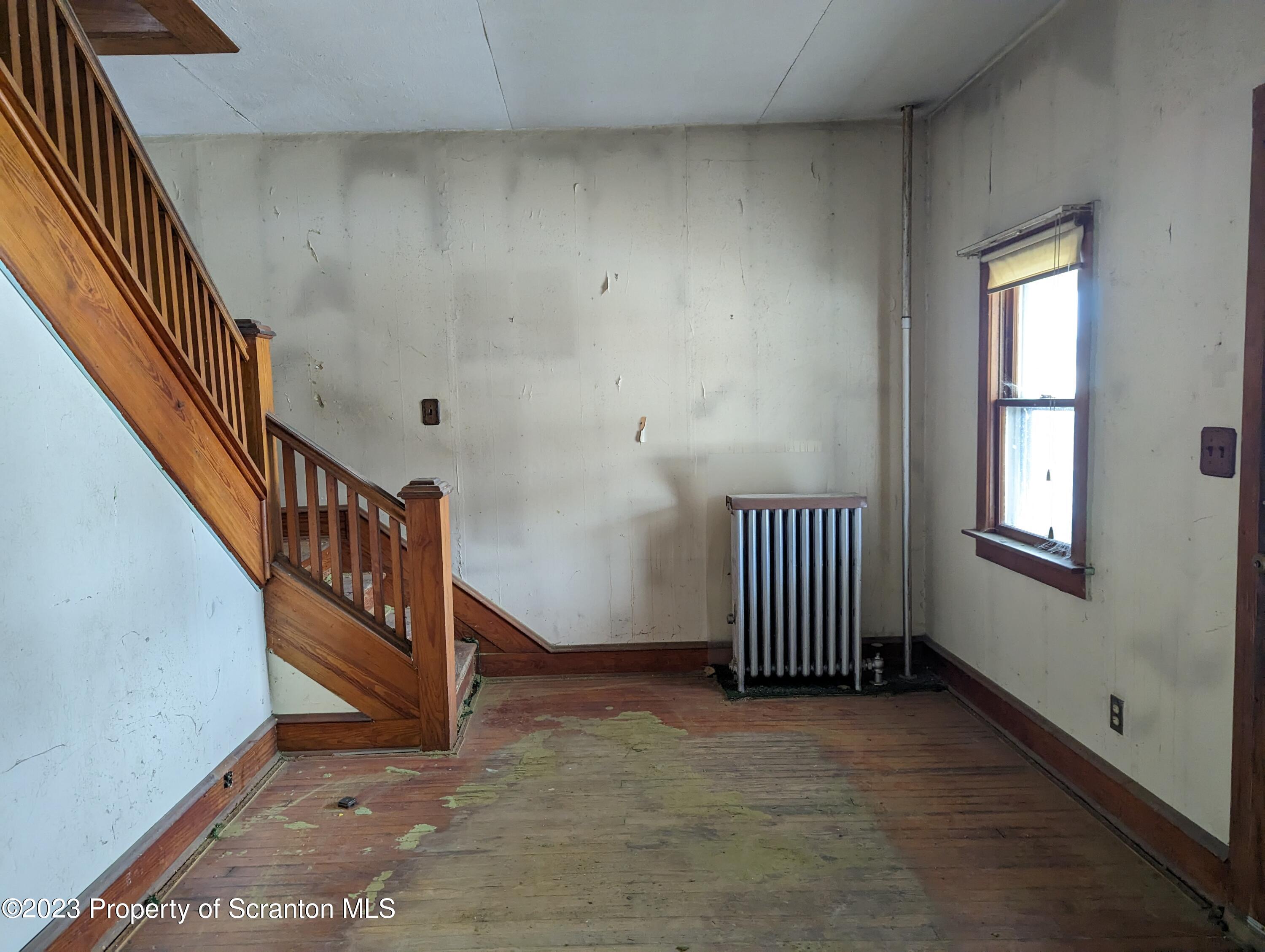 710 Edgebrook Drive Moosic, PA 18507 - Photo 10 of 19 a view of an empty room with stairs