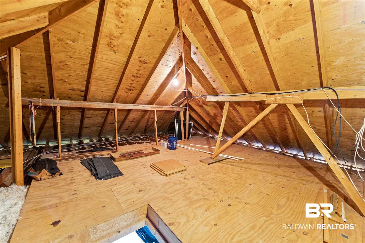 516 Ridgewood Drive Daphne, AL 36526 - Photo 26 of 38 Floored Attic Storage