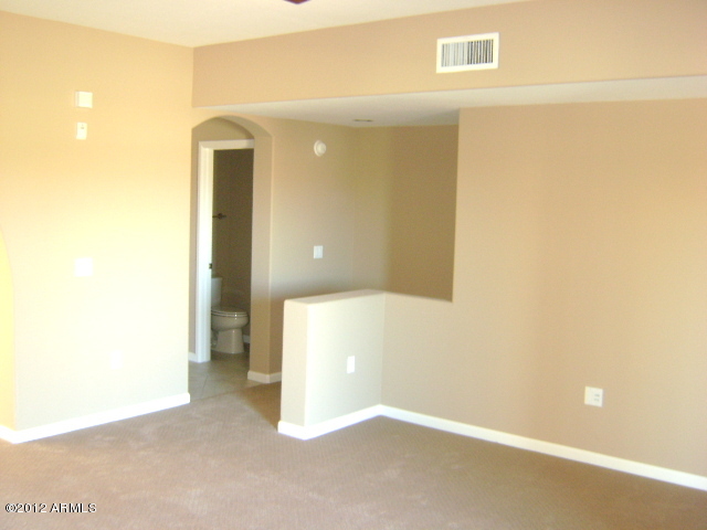 3935 East Rough Rider Road, Unit 1198 Phoenix, AZ 85050 - Photo 11 of 23 LIVINGROOM