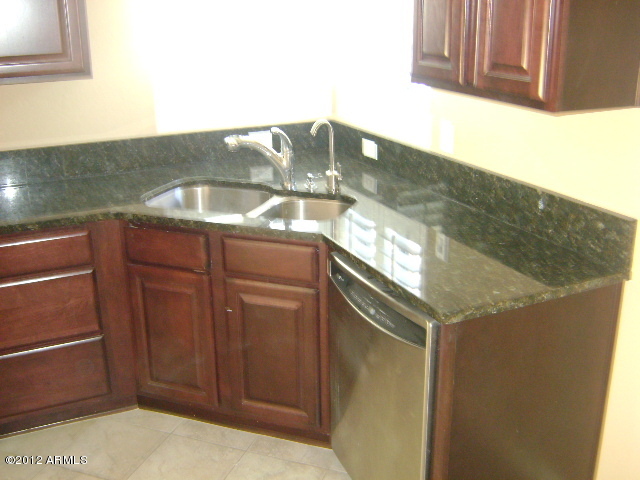 3935 East Rough Rider Road, Unit 1198 Phoenix, AZ 85050 - Photo 8 of 23 KITCHEN