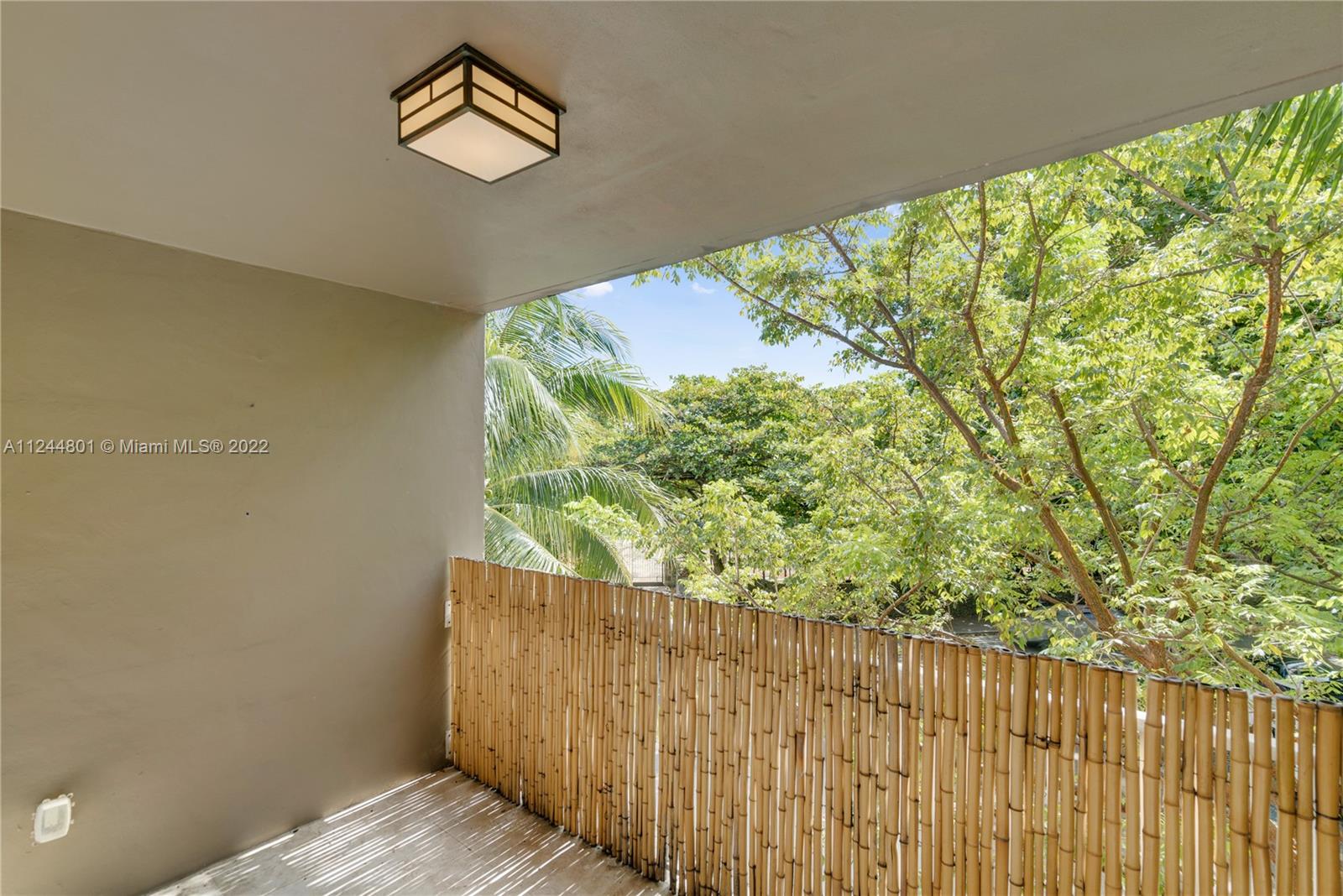 3540 Main Highway, Unit 309 Miami, FL 33133 - Photo 28 of 34 a view of entryway with wooden floor