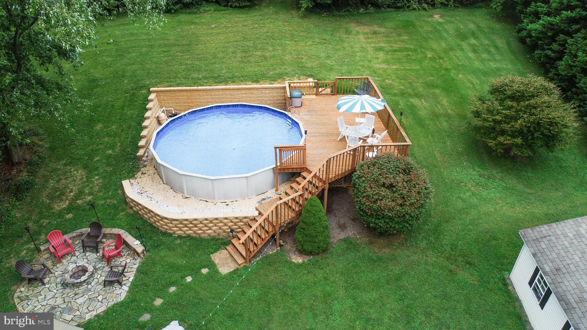 7902 Redstone Road Kingsville, MD 21087 - Photo 14 of 51 Pool, firepit and decking all for entertaining
