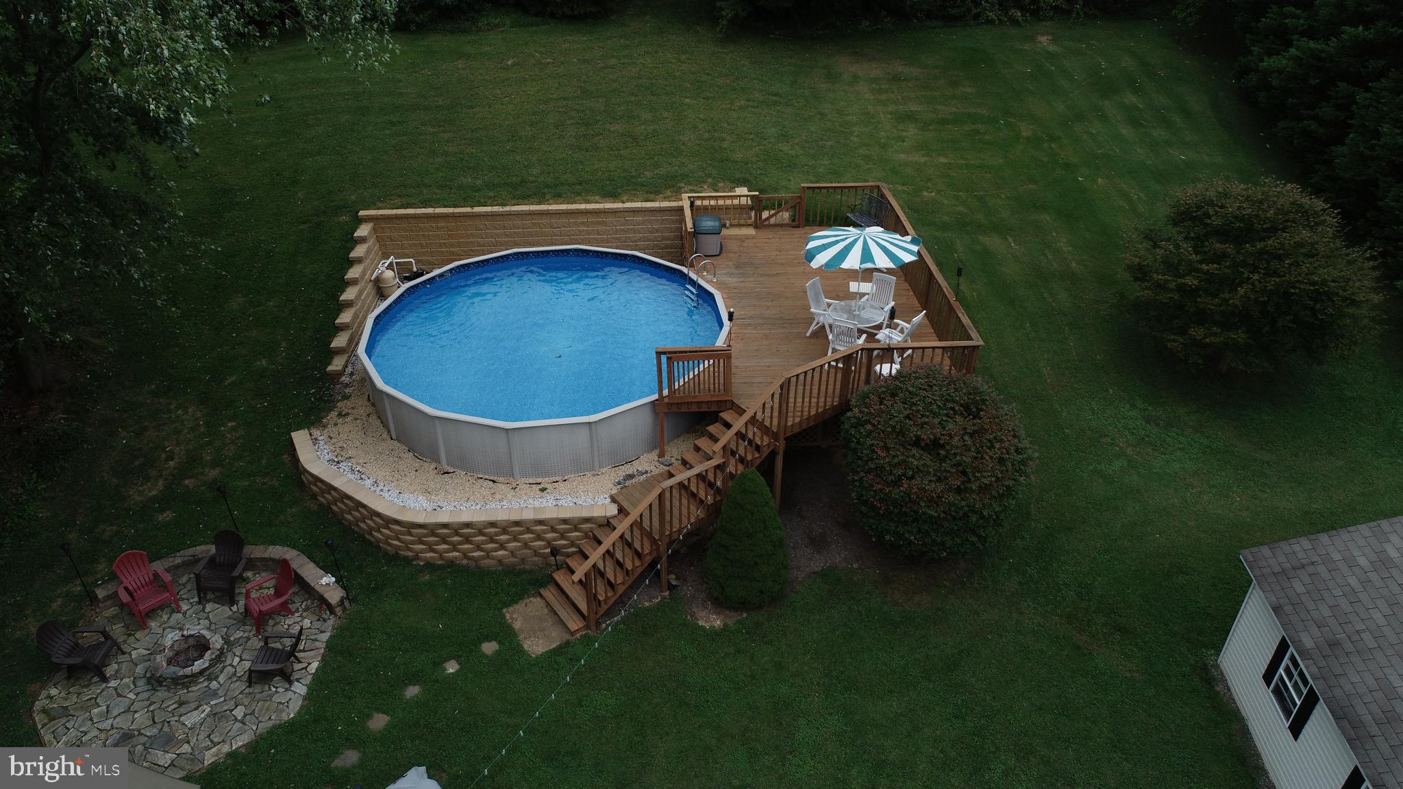 7902 Redstone Road Kingsville, MD 21087 - Photo 51 of 51 Beautiful decking surrounding above Ground Pool