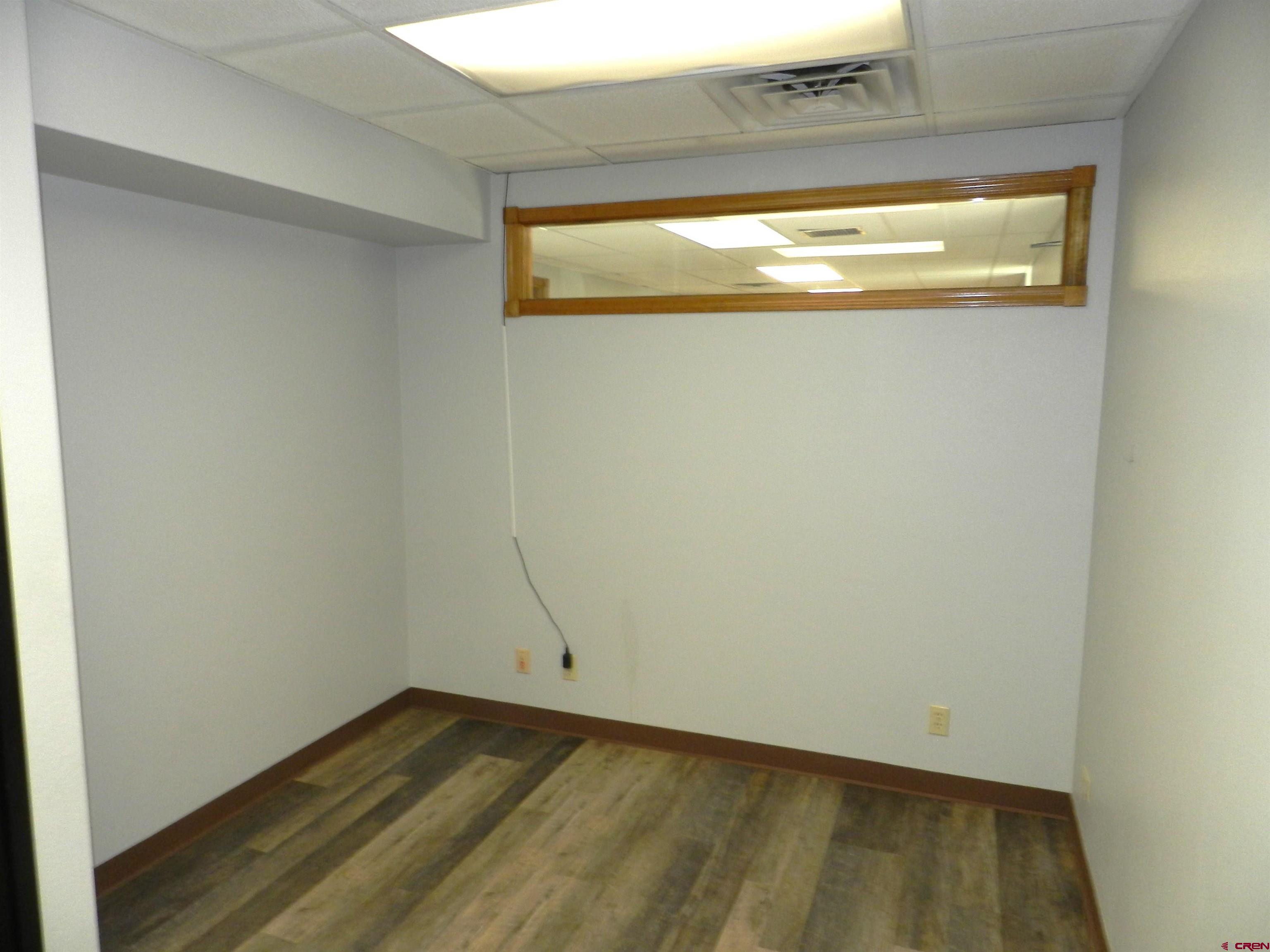 18 North Uncompahgre Avenue, Unit BACK SECTION OF 501 E MAIN BUILDING Montrose, CO 81401 - Photo 20 of 24 a view of empty room with window