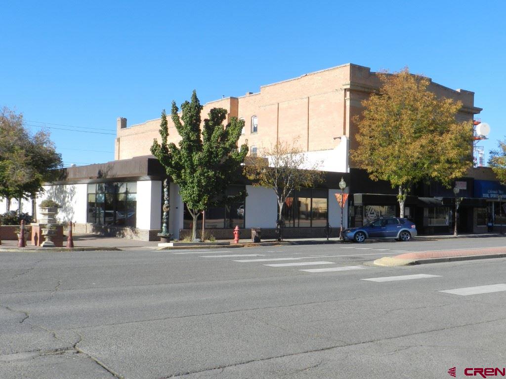 18 North Uncompahgre Avenue, Unit BACK SECTION OF 501 E MAIN BUILDING Montrose, CO 81401 - Photo 2 of 24 a view of a building with a street
