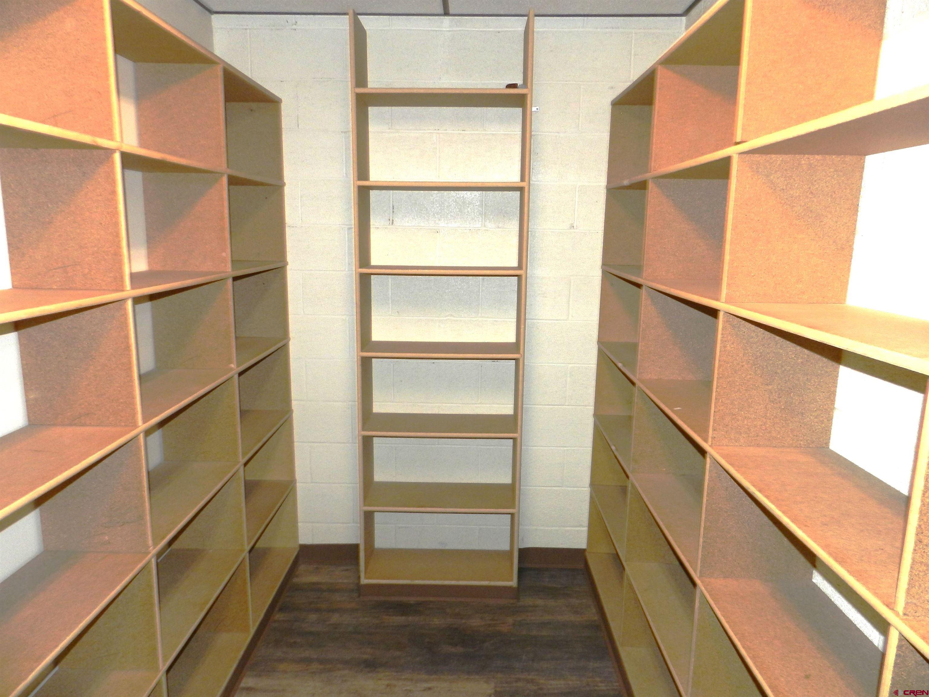 18 North Uncompahgre Avenue, Unit BACK SECTION OF 501 E MAIN BUILDING Montrose, CO 81401 - Photo 23 of 24 a view of walk in closet with empty racks