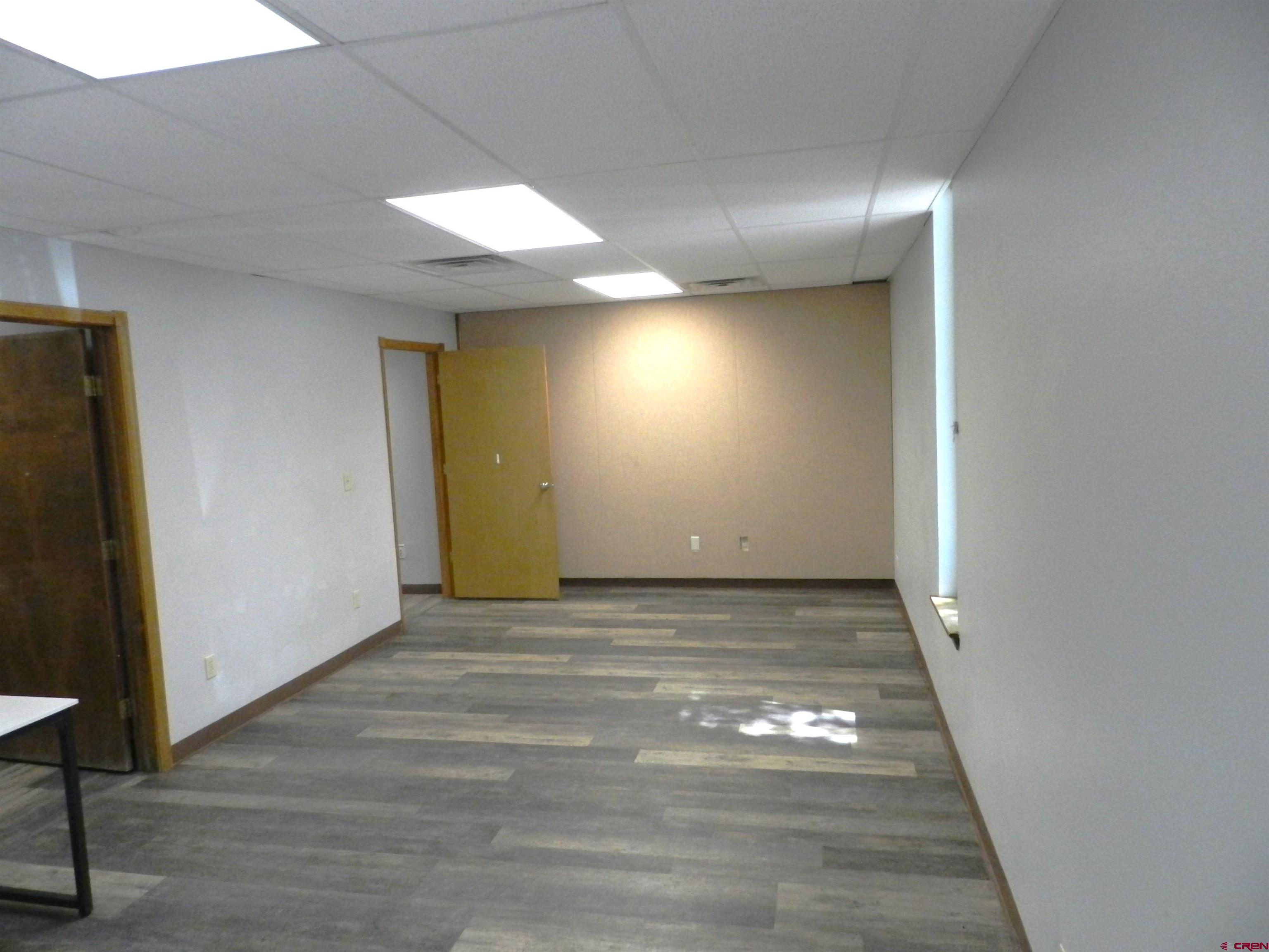 18 North Uncompahgre Avenue, Unit BACK SECTION OF 501 E MAIN BUILDING Montrose, CO 81401 - Photo 4 of 24 a view of an empty room