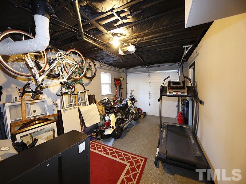 7209 Fiesta Way Raleigh, NC 27615 - Photo 20 of 24 a view of a room with gym equipment