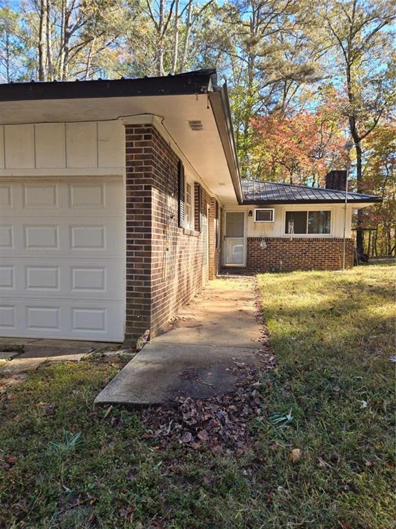 735 Seabreeze Lake Road Buchanan, GA 30113 - Photo 3 of 13 a view of a house with a yard