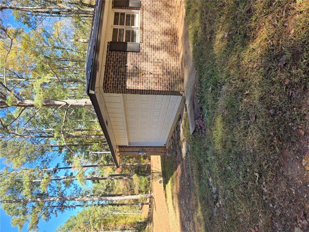 735 Seabreeze Lake Road Buchanan, GA 30113 - Photo 5 of 9 a backyard of a house