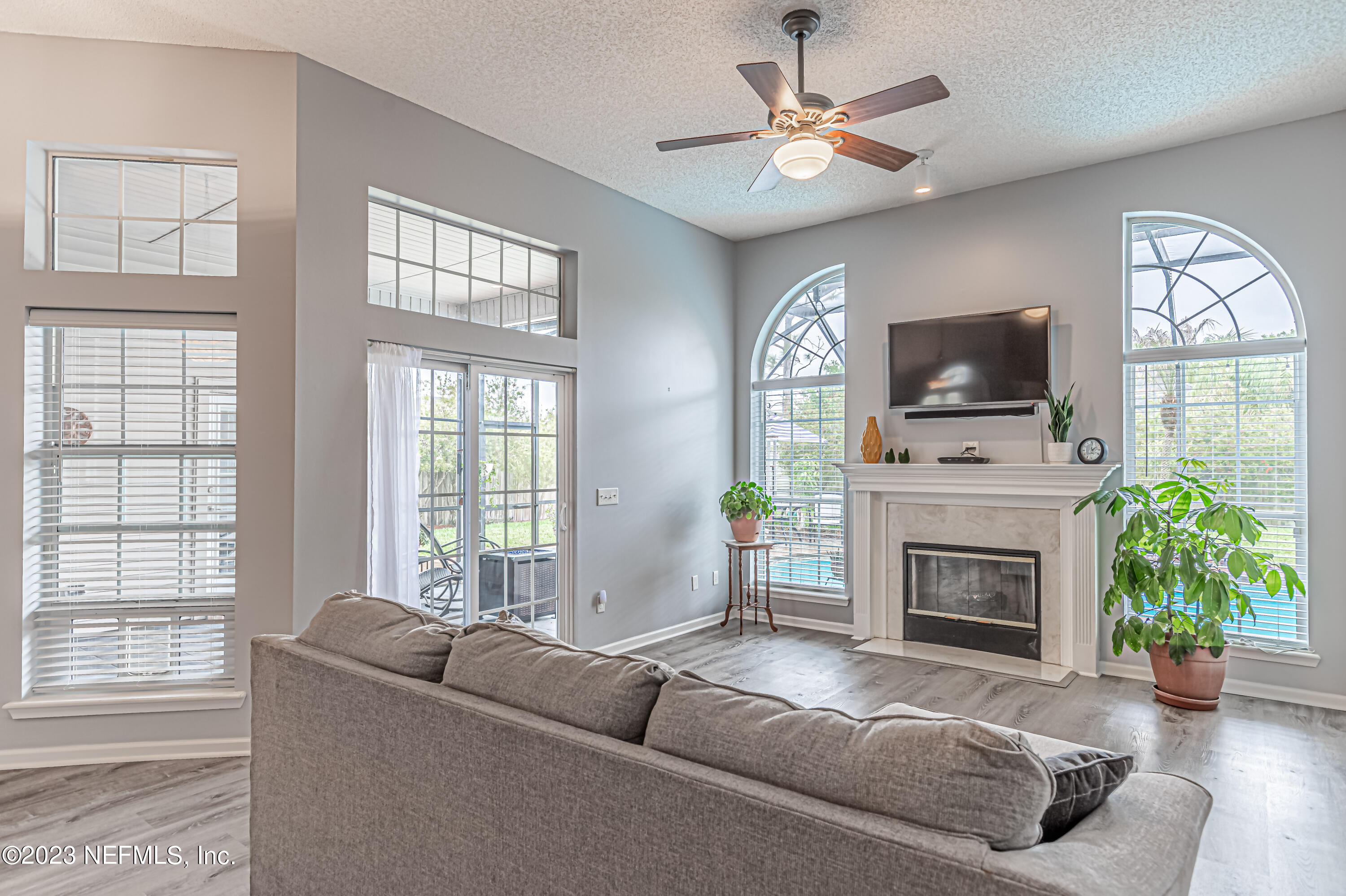 1836 Old Fleming Grove Road Fleming Island, FL 32003 - Photo 15 of 55 Floor to ceiling windows