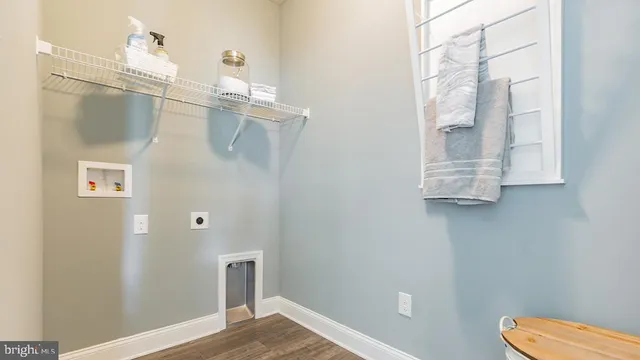 a bathroom with a shower and toilet