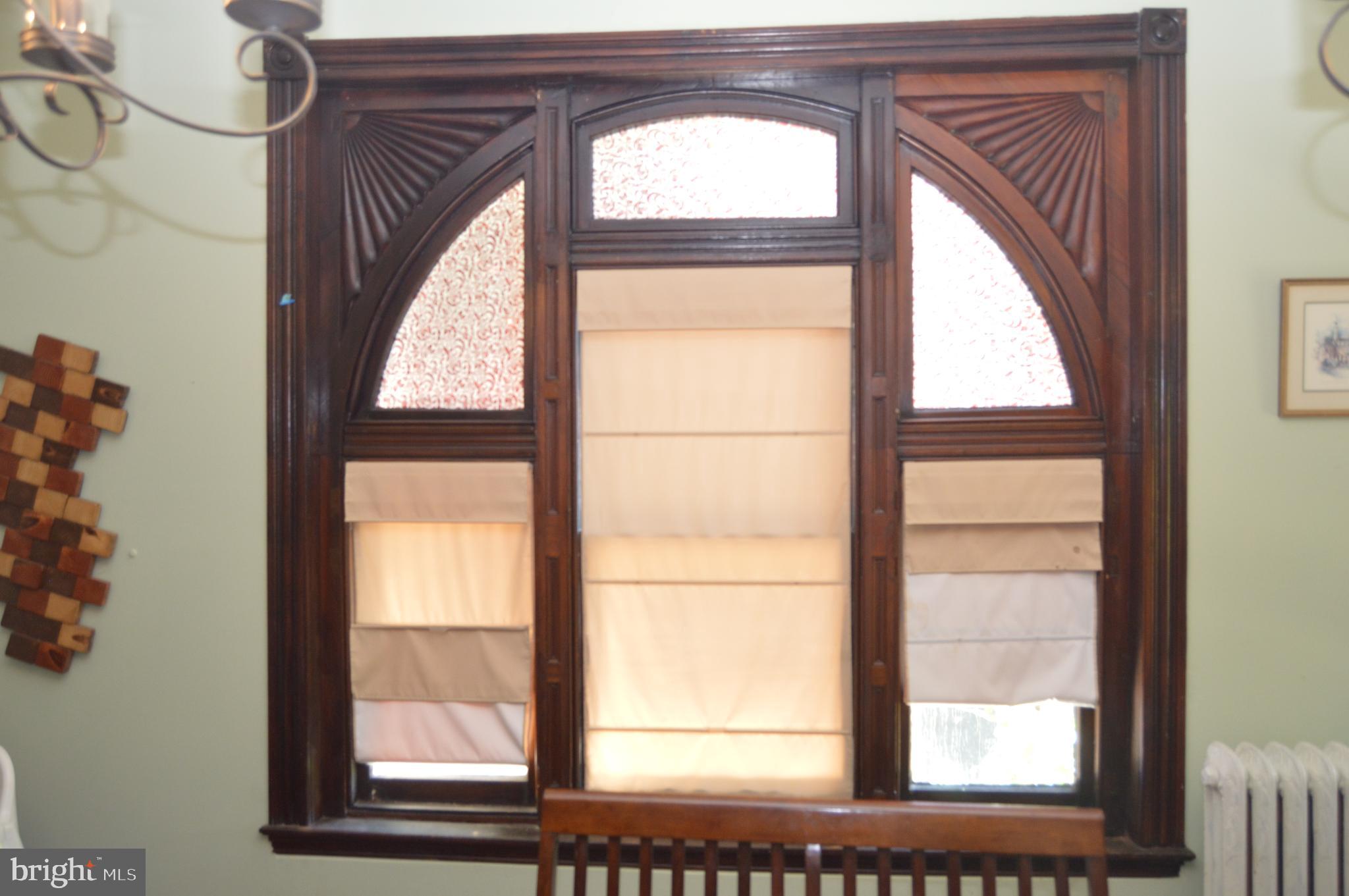 1536 Mineral Spring Road Reading, PA 19602 - Photo 30 of 61 Elegant vintage window with intricate woodwork.