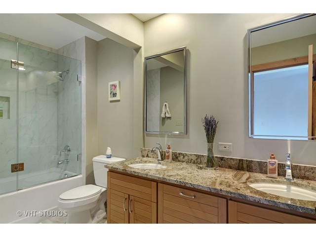 5727 Hampton Drive Long Grove, IL 60047 - Photo 19 of 25 a bathroom with a granite countertop sink toilet and shower
