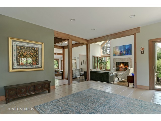5727 Hampton Drive Long Grove, IL 60047 - Photo 3 of 25 a living room with furniture window and a fireplace
