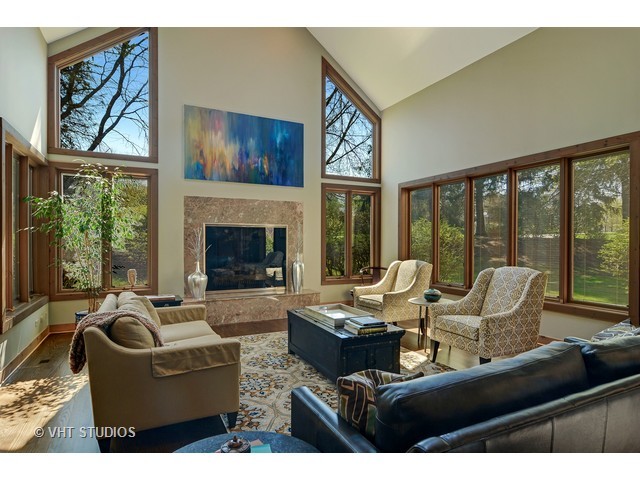 5727 Hampton Drive Long Grove, IL 60047 - Photo 4 of 25 a living room with furniture large window and fireplace