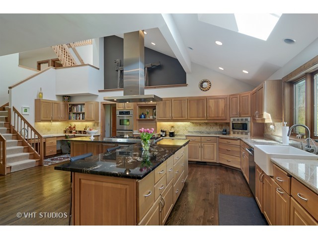 5727 Hampton Drive Long Grove, IL 60047 - Photo 6 of 25 a kitchen with stainless steel appliances granite countertop a sink and cabinets