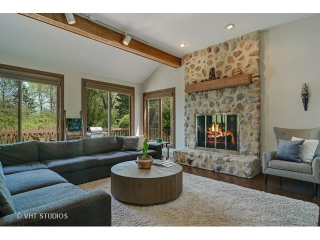 5727 Hampton Drive Long Grove, IL 60047 - Photo 9 of 25 a living room with furniture and a large window