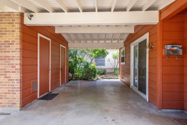 a view of a back yard from a room